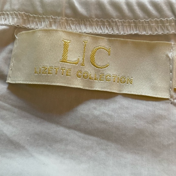 Lizette Collection Medium Ivory Low Cut Corset Blouse with Tiered Bishop Sleeves - Picture 2 of 16